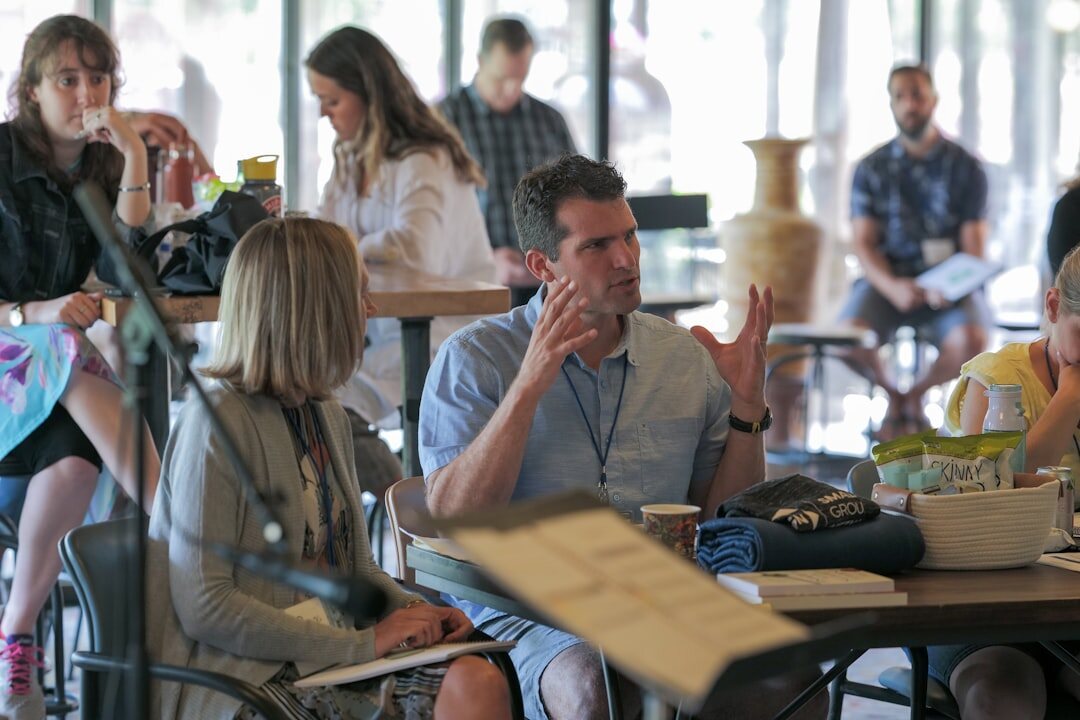 Small group discussing around a table during a workshop