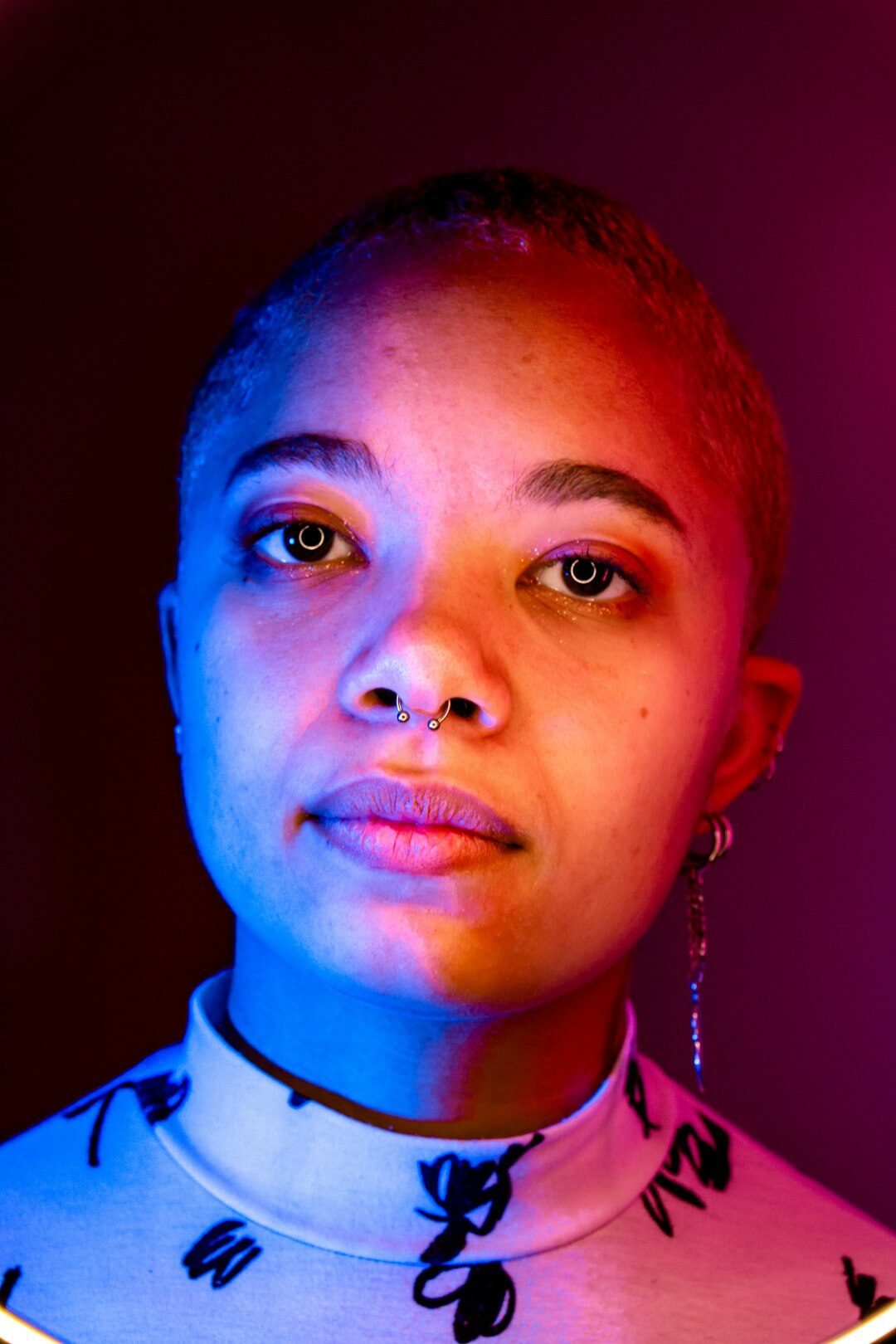 Studio portrait of a black woman with short hair